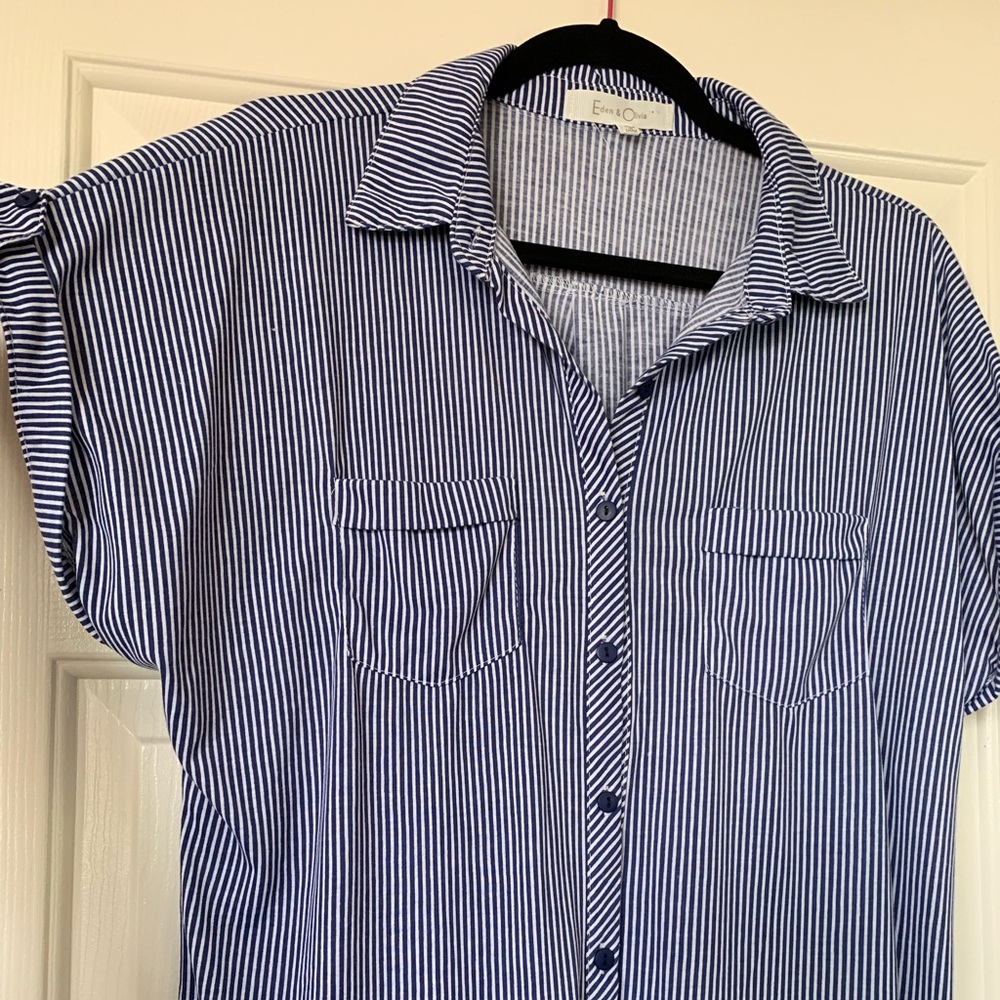 Blue striped top.